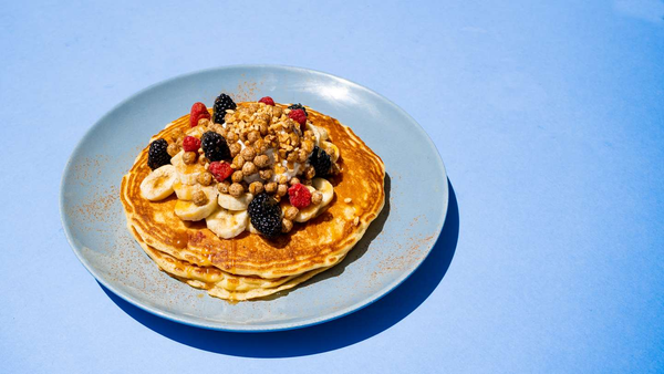 A stack of pancakes topped with Cinnamon Cereal