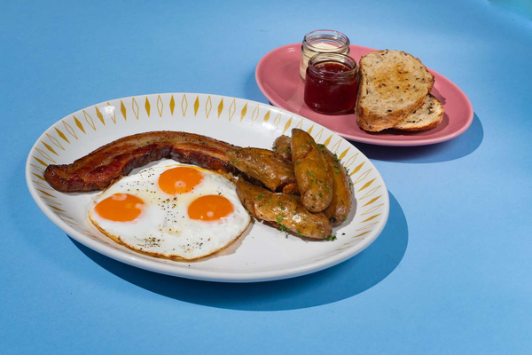 Three farm fresh eggs, choice of bacon, pork sausage or chicken sausage, potatoes, toast, jam