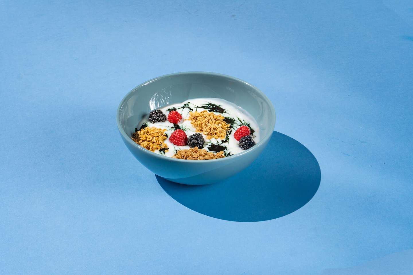 Vanilla yogurt, granola, macerated berries, chlorophyll, fresh berries